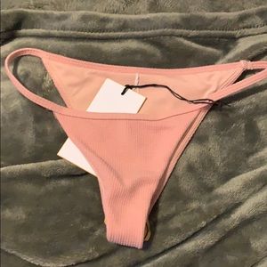 Pink cheeky bikini bottoms
